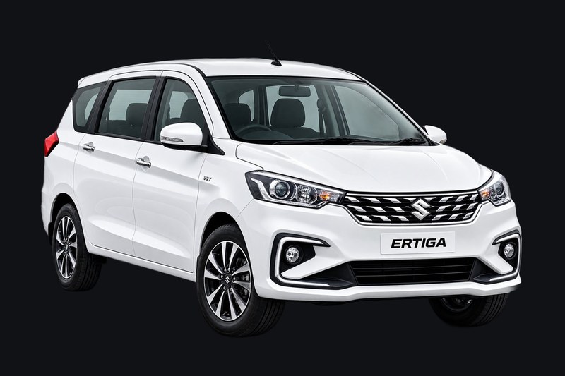 White Maruti Suzuki Ertiga seven-seater from the B&B Tours and Travels fleet